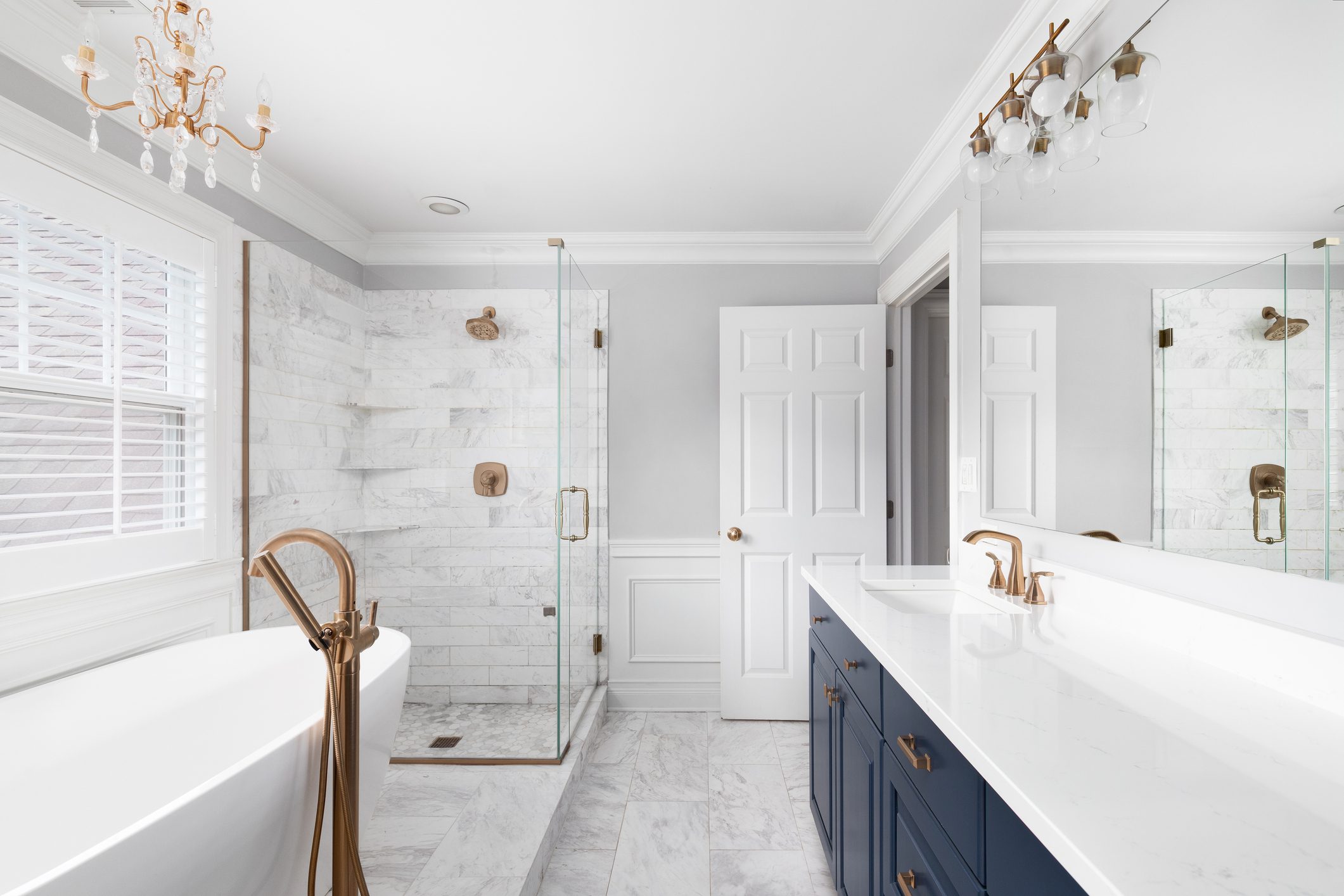 Modern bathroom with bathtub and shower.